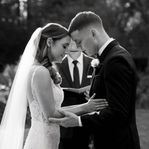 Emotional black and white wedding moment
